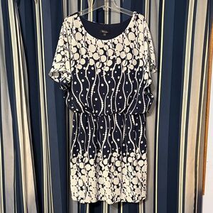 Fun and funky navy and white polka dots dress. S.L. Fashions, size 18W.